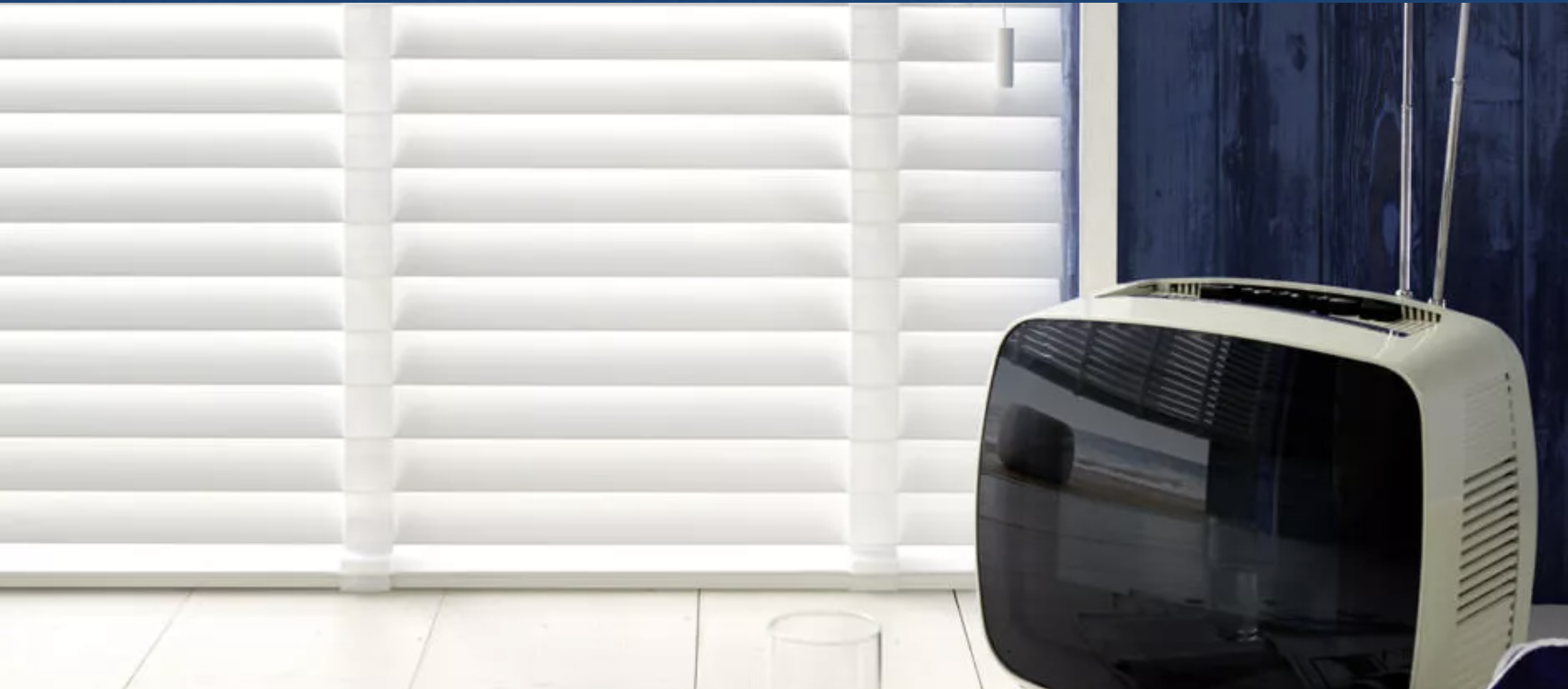 Classic wooden blinds in home office setting